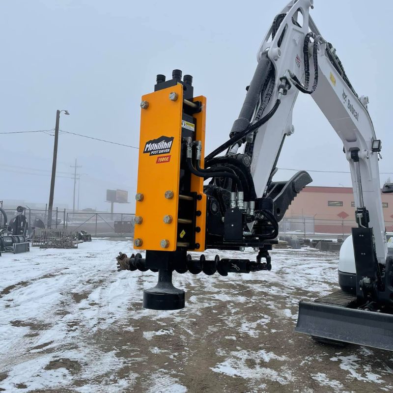 Bobcat excavator with the Montana Post Driver Attachment. 