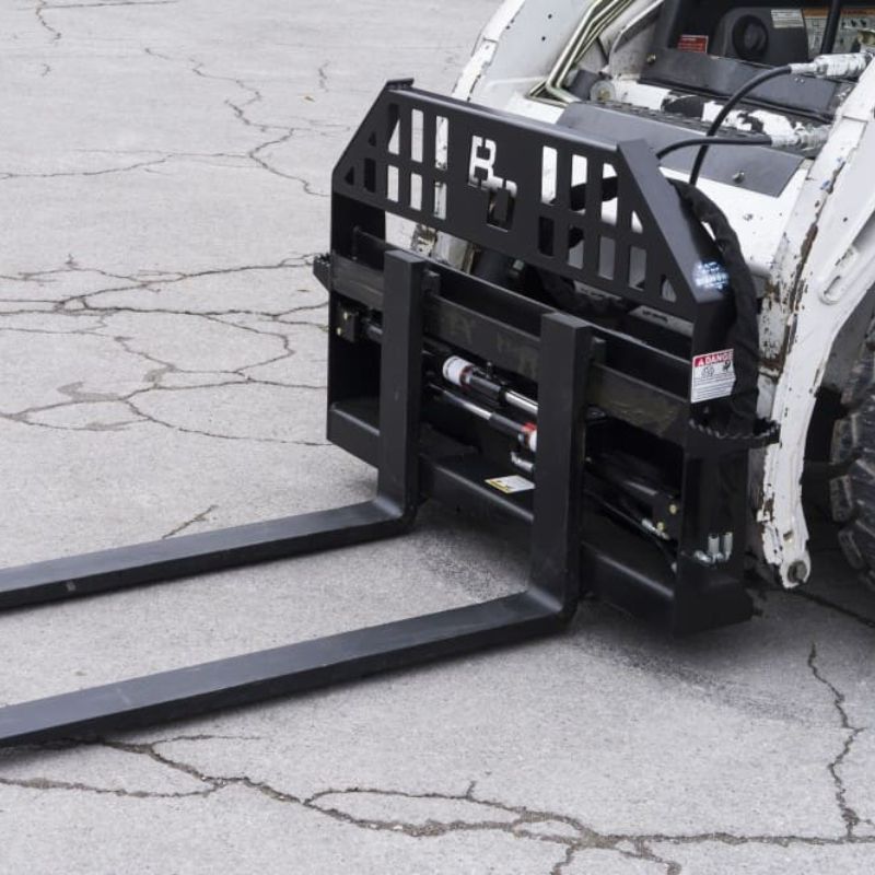 skid steer with a 4,000 capacity pallet fork from blue diamond