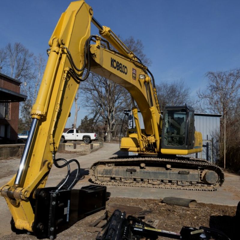 Blue Diamond Hydraulic Breaker Skid Steer attachment in use