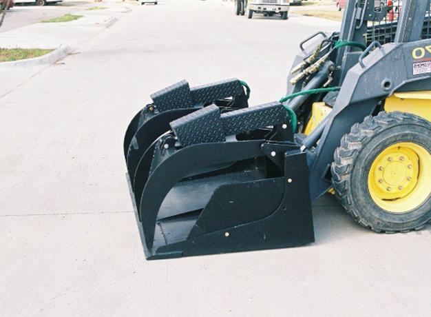 grapple bucket attachment on the ground from star industries