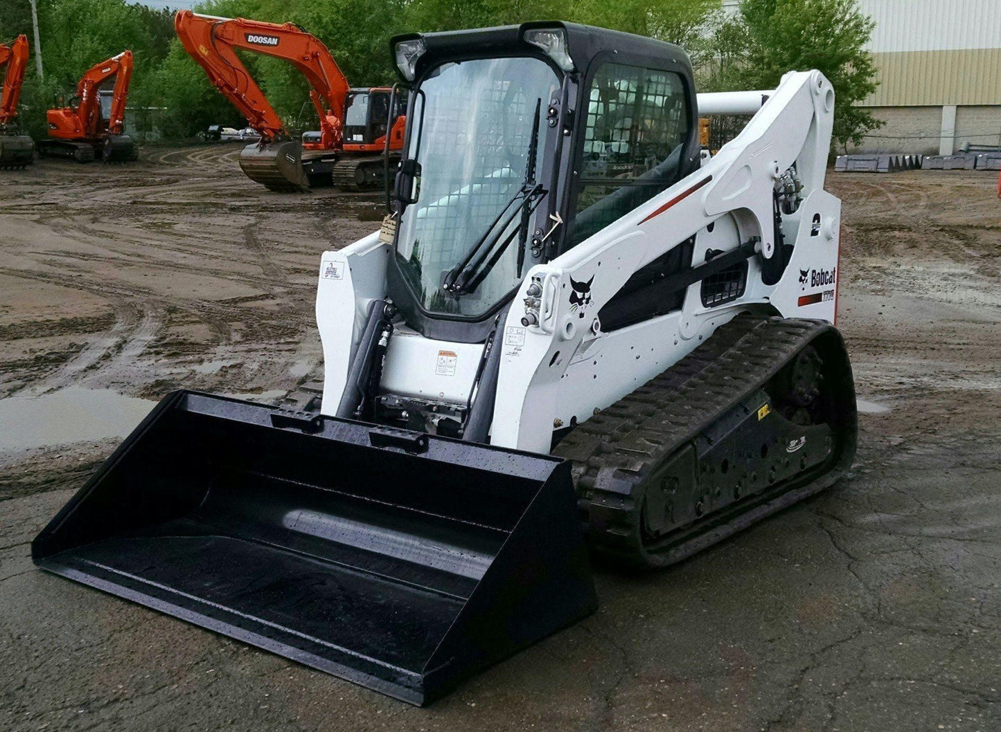 Bobcat Skid Steer with Low Profile Extended Lip Bucket Berlon Industries