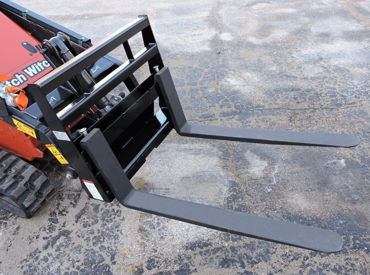 ditch witch mini skid steer with the mini pallet forks from berlon