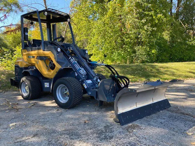 mini skid steer with the mini snow blade from berlon