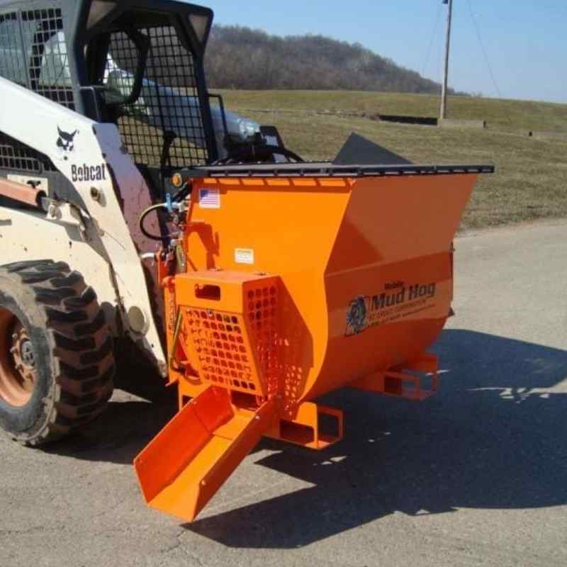 bobcat skid steer with the concrete mixer and dispenser attachment from ezg manufacturing