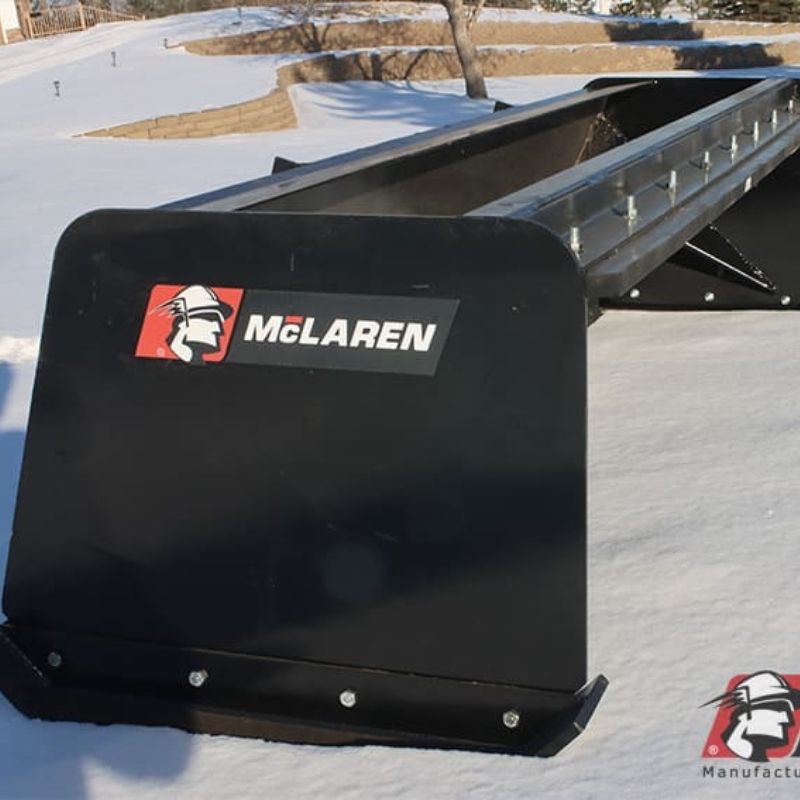side and front view of the mclaren skid steer snow pusher box attachment