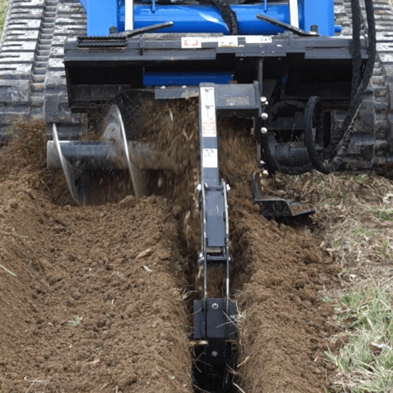 skid steer in use with the blue diamond trencher