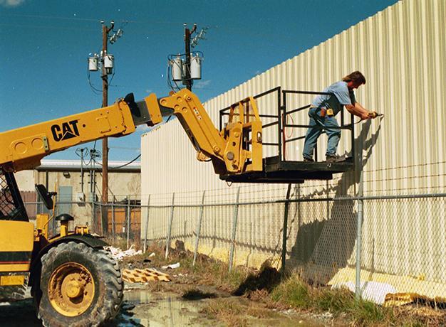 cat telehandler with the safety work platform by star industries