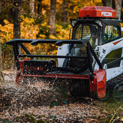 Blackhawk fecon mulcher grinding large tree