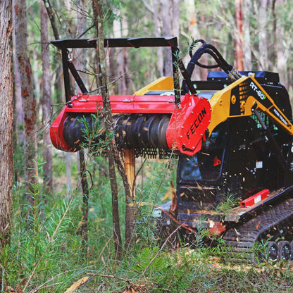 Bull hog low flow grinding a tree to mulch