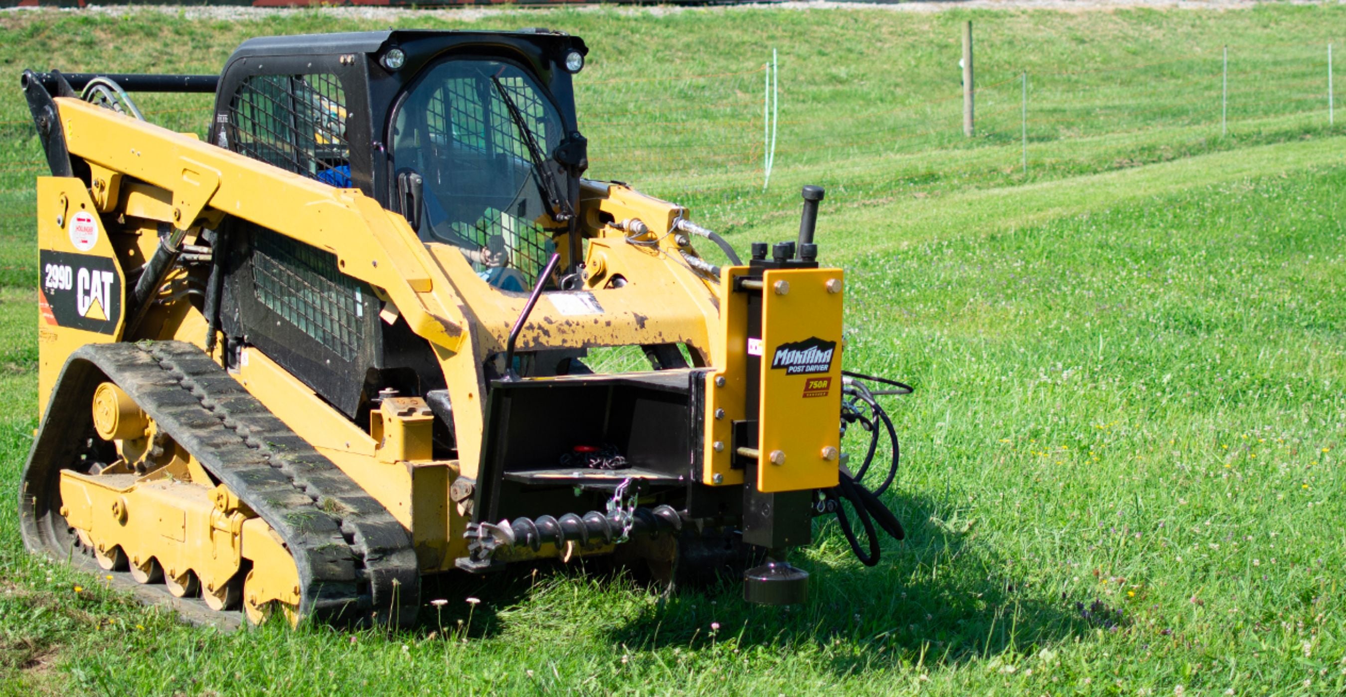 cat-skid-steer-with-the=montana-post-driver-in-the-field