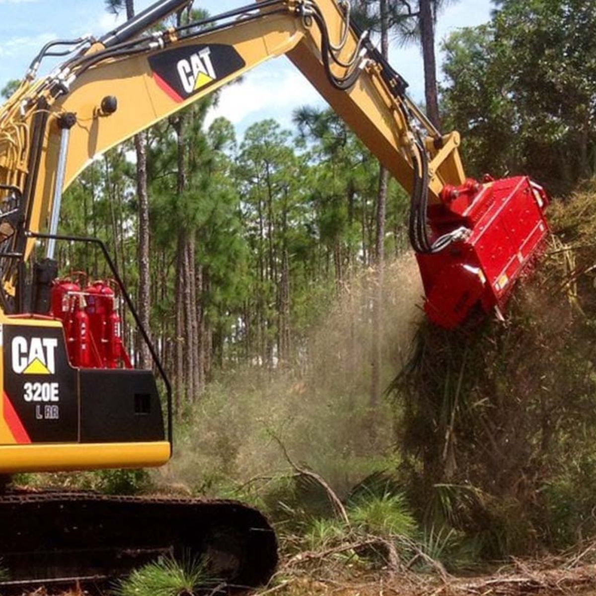 mulching-trees-with-the-cat-excvator-using-the-fecon-mulcher-attachment