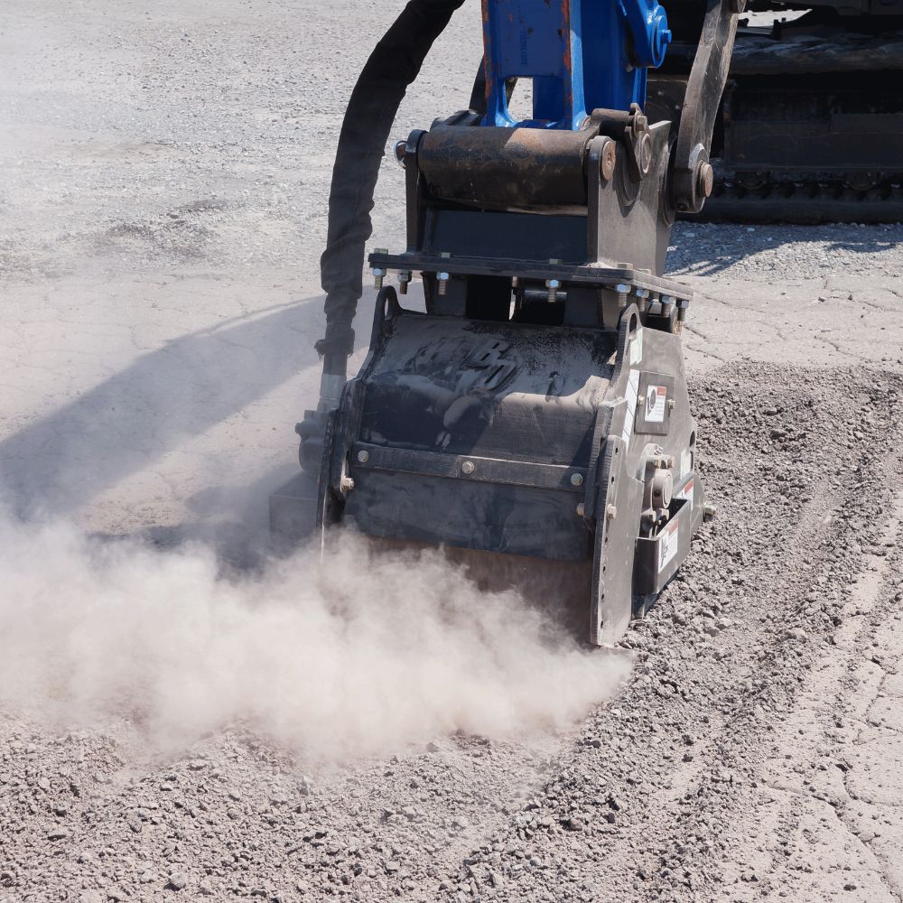 excavator-attachment-in-action-milling-asphalt