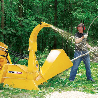 feeding-wood-to-a-wallenstein-wood-chipper-attachment