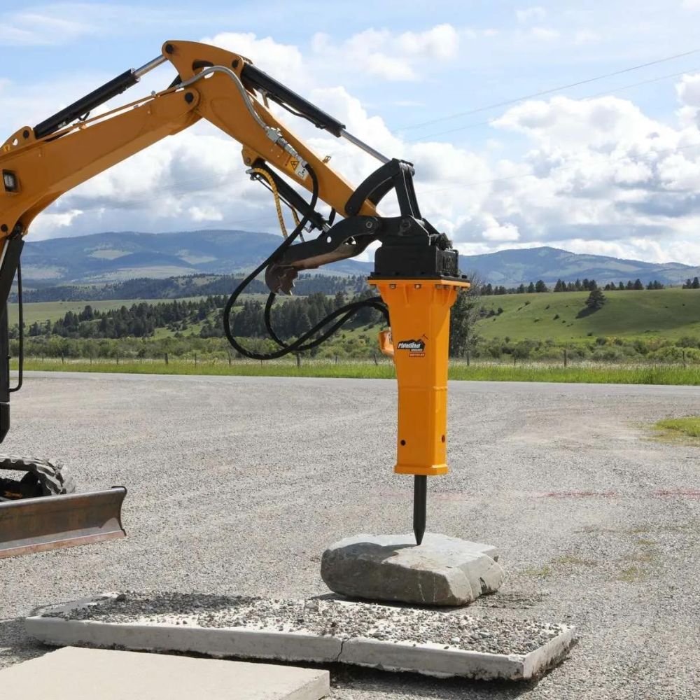 mini-excavator-breaking-concrete-with-the-montana-breaker-attachment