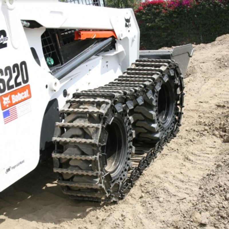 Bobcat with the steel over the tire tracks from McLaren Industries