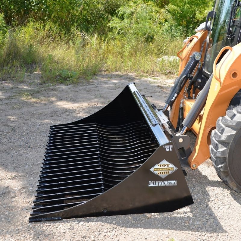 Bucket collection of Top Dog Attachments in the field