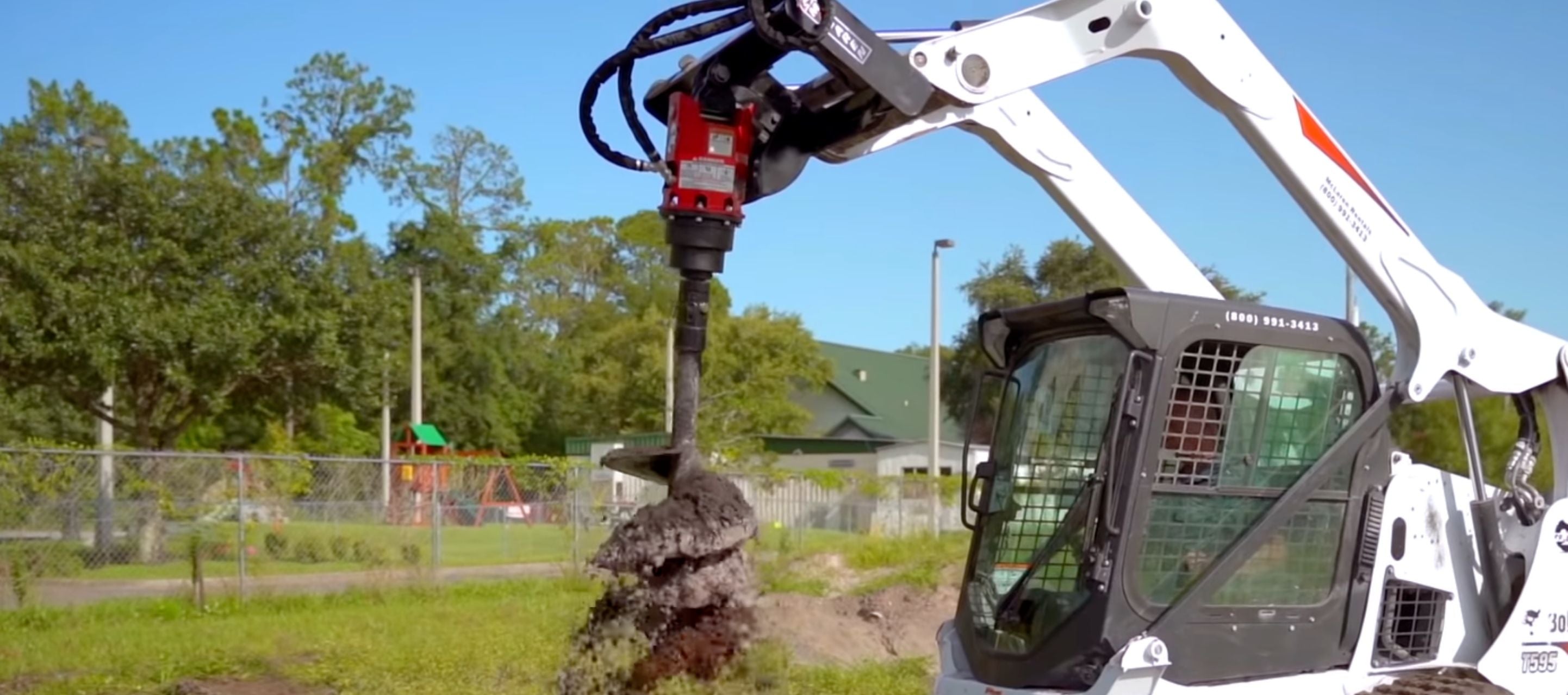 Drilling holes using the high capacity Auger attachment on a skid steer