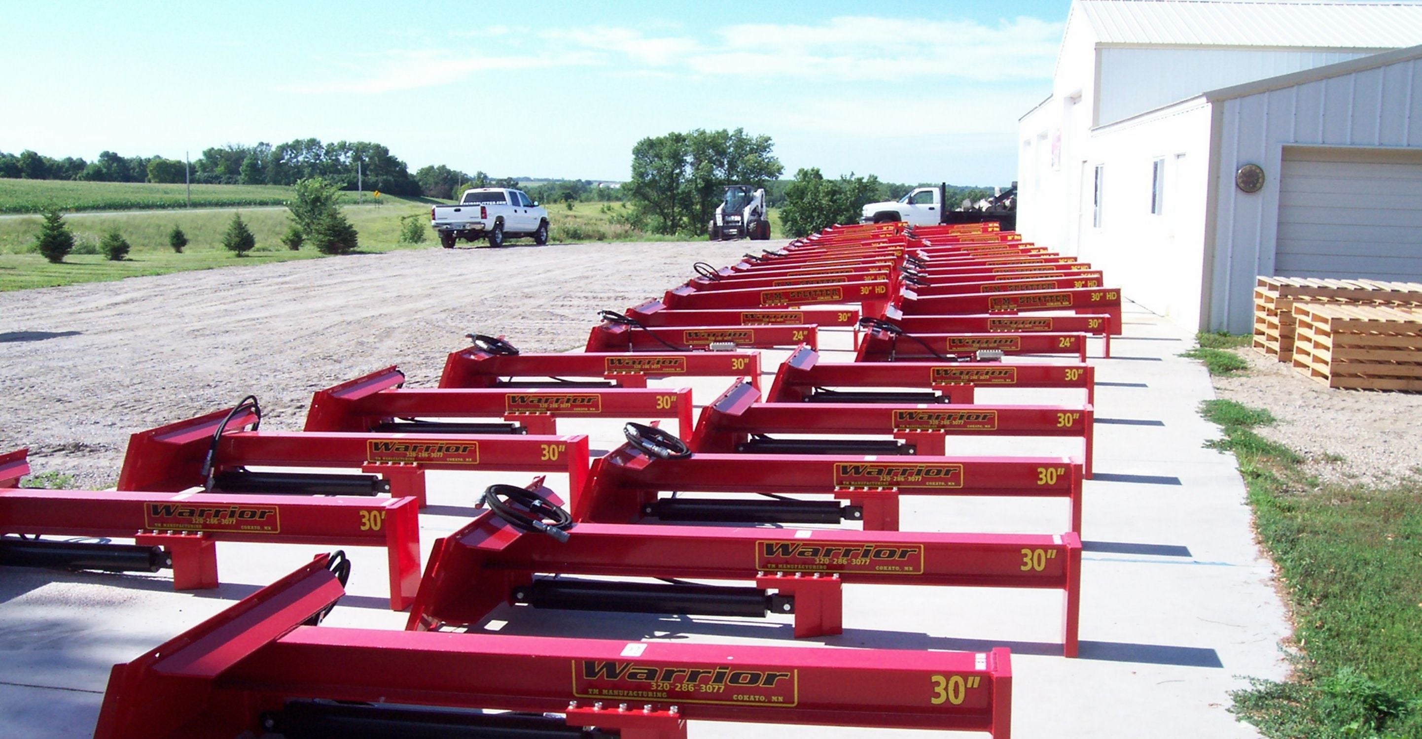 Log Splitter attachments on the ground from TM manufacturing