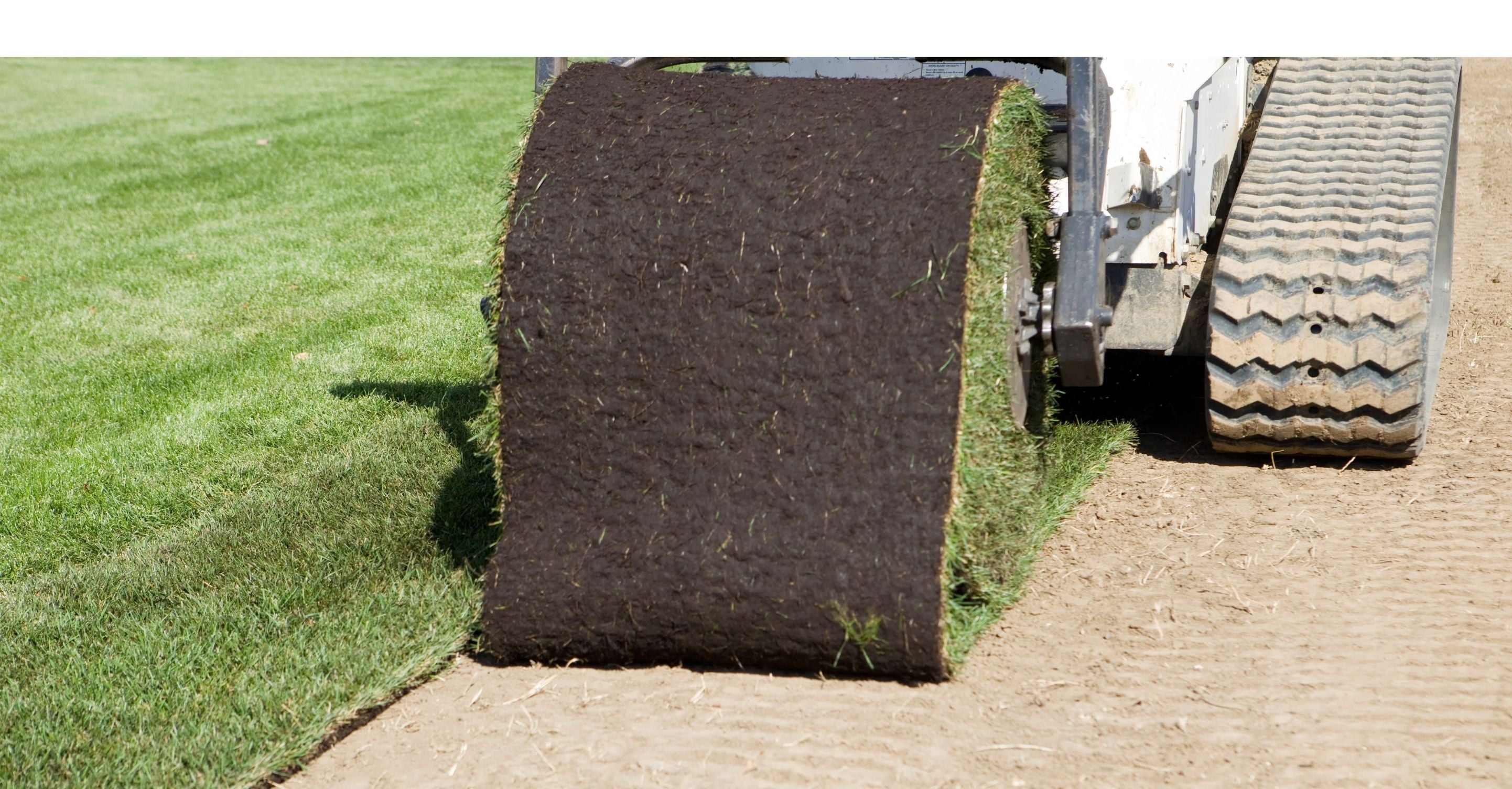 Installing grass with the Blue Diamond sod roller attachment