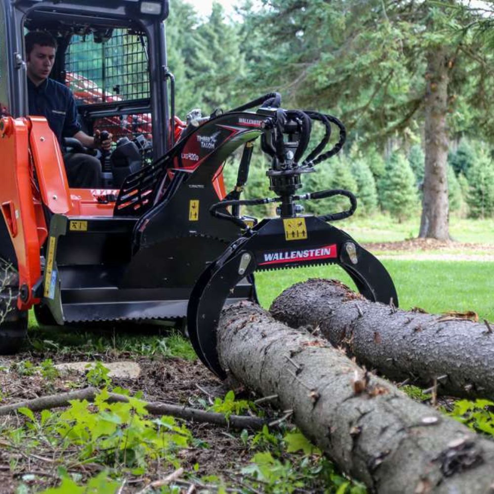 skid-steer-attachment-by-wallenstein-for-grapping-logs-in-the-forest