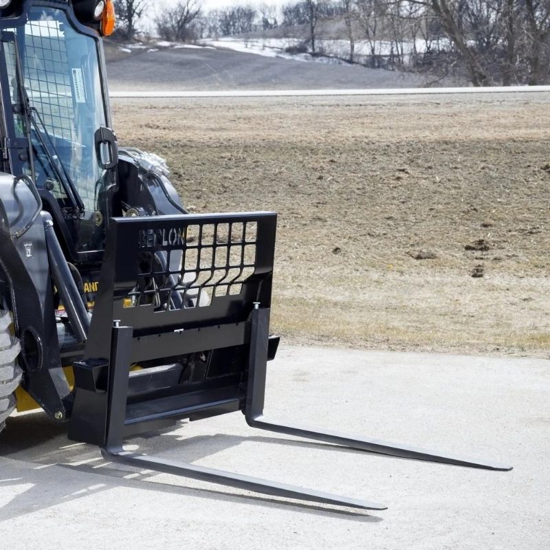 Skid Steer with pallet forks attachment from Berlon