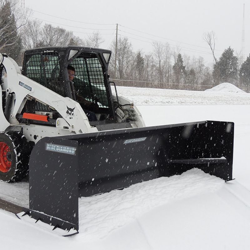 bobcat-skid-steer-with-the-blue-diamond-snow-pusher-attachment