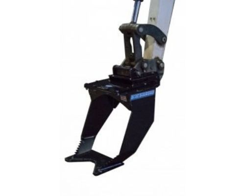 Blue diamond tree grubber attachment on a bobcat excavator