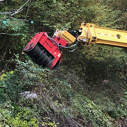 CEM36-mulcher-equipment-by-fecon-in-the-forest