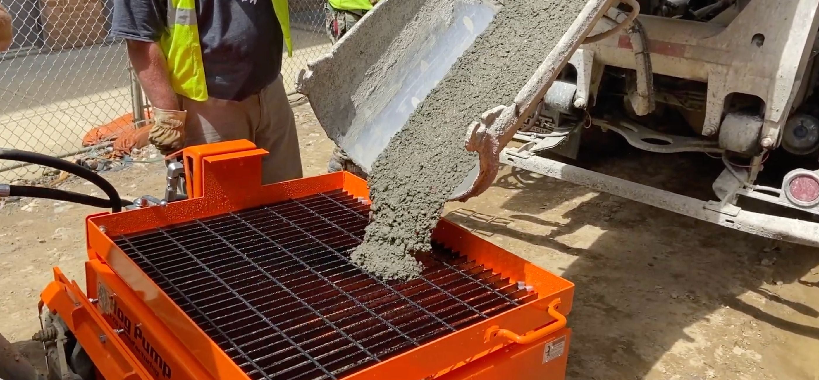 pouring-concrete-into-the-ezg-concrete-pump-attachment