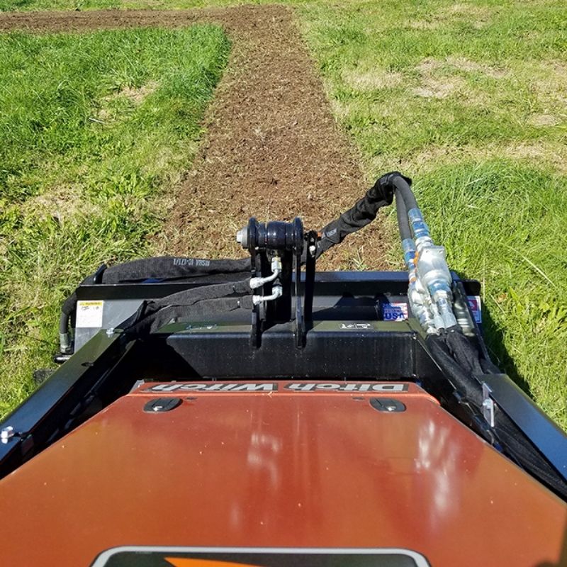 Conditioning the soil using the mini skid steer rototiller attachment from Blue Diamond