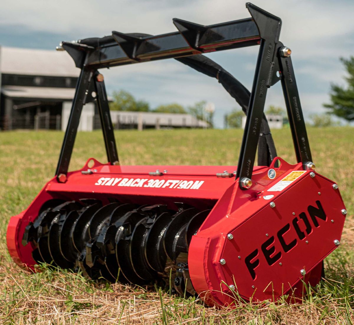 fecon standard flow bull hog sitting in the grass