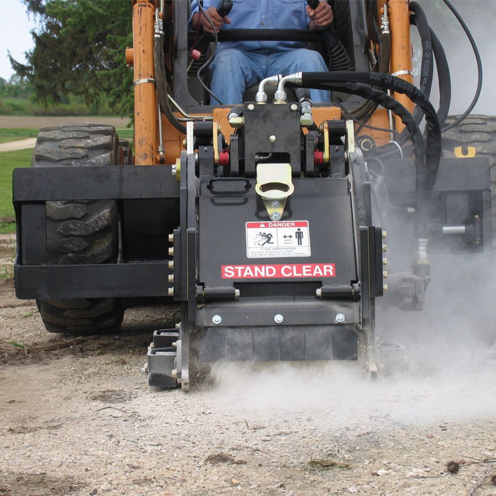 Skid-steer-with-the-front-view-cold-planer-on-skid-steer-in-action