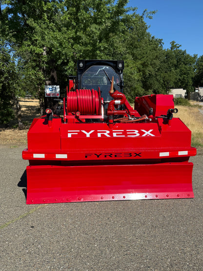 Front view of a red FYREBX firefighting blade and hose reel mounted on a track loader parked outdoors