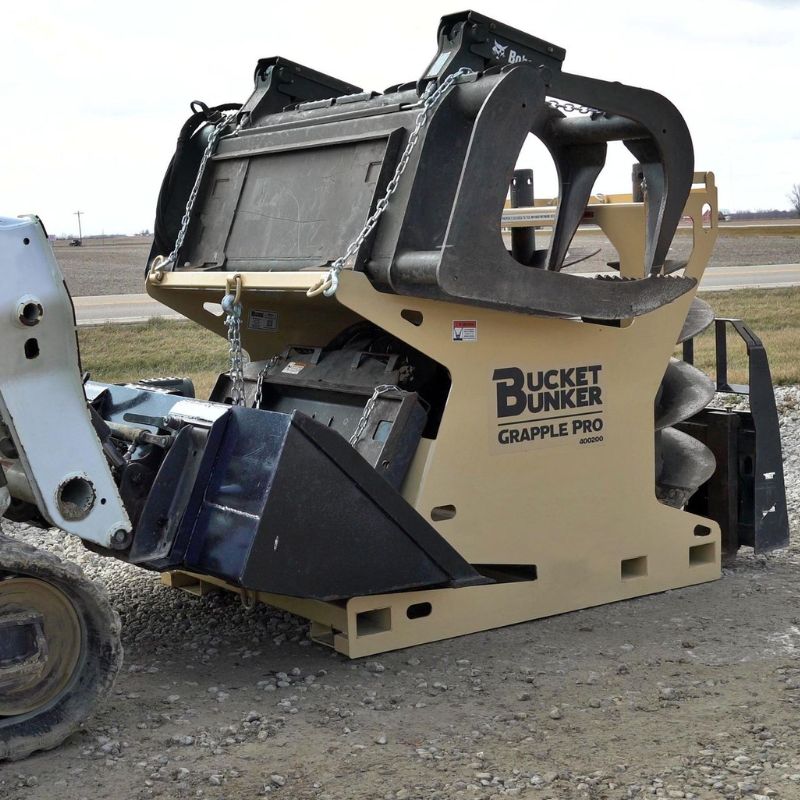 skid-steer-with-the-grapple-pro-attachment-by-bucket-bucket-in-action