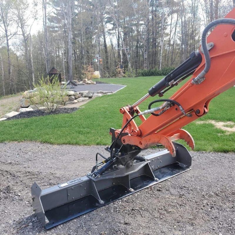 Kubota with the grading beam from skeer system in flesh