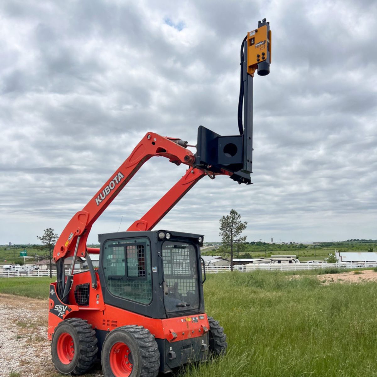 montana-post-driver-in-action-on-a-kubota-skid-steer