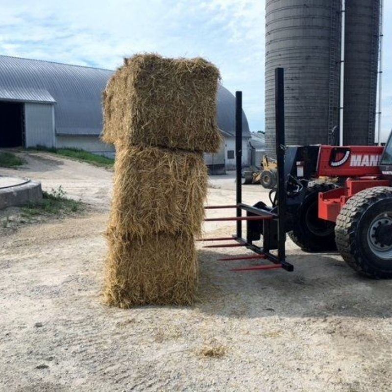 Manitou with the bale spear attachment in action