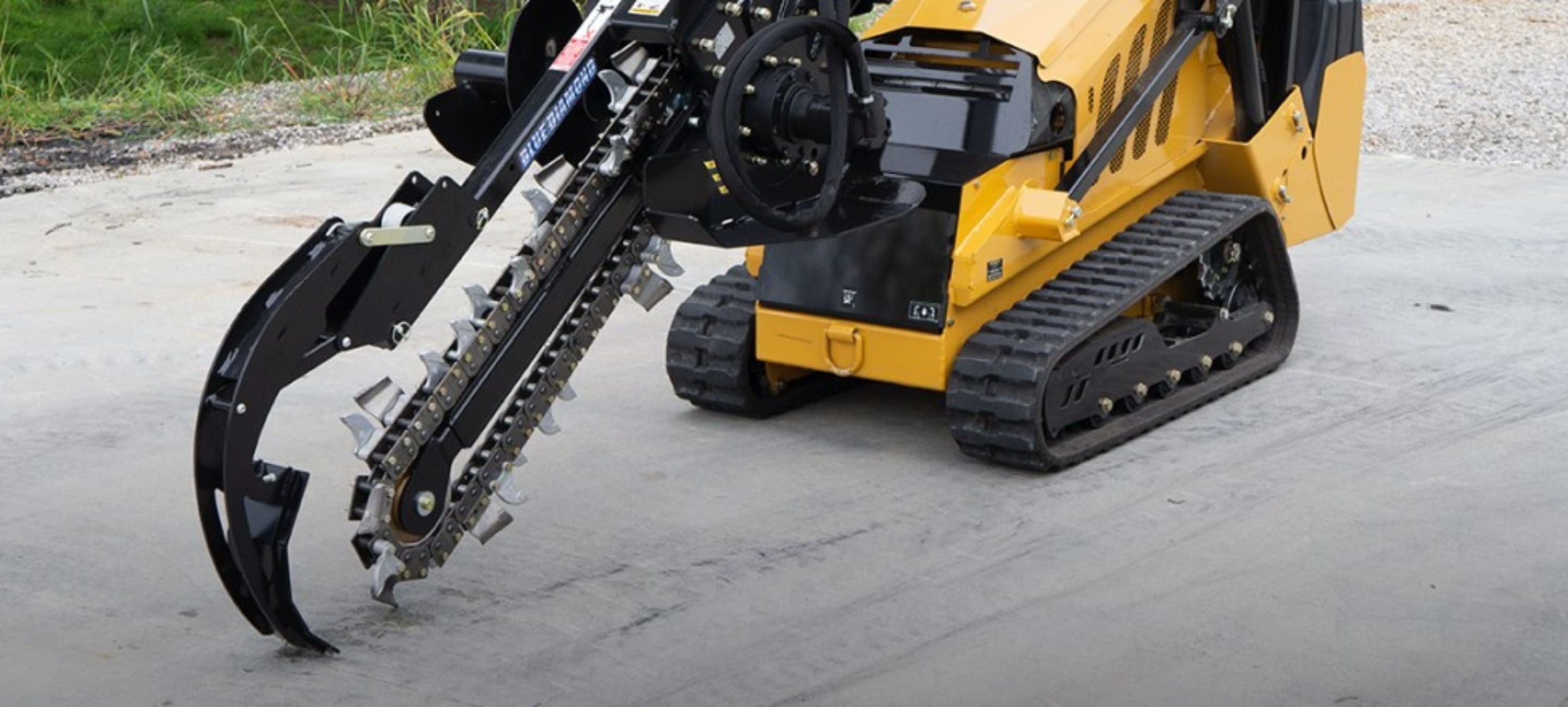 Vermeer mini skid steer with the Blue Diamond trencher in action