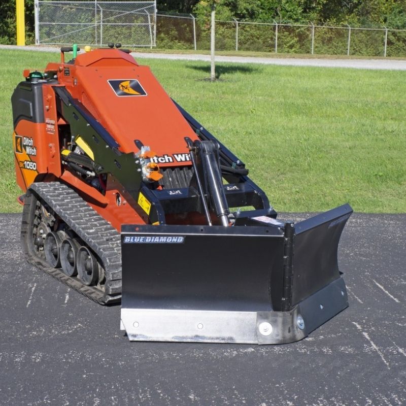 Ditch Witch with the V blade attachment for mini skid steers by Blue Diamond