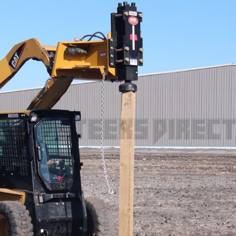 Cat skid steer with the dakota post driver 1850 in action. 