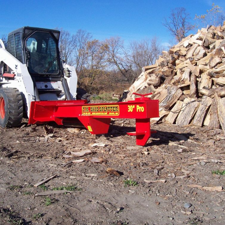 Bobcat skid steer with the Pro 2 Skid Splitter in action. 