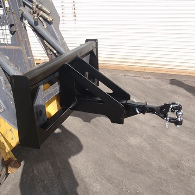 Skid steer with the trailer mover attachment from Berlon