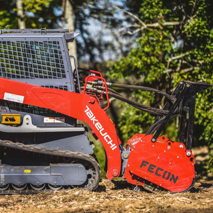 Takeuchi with Fecon mulcher side view