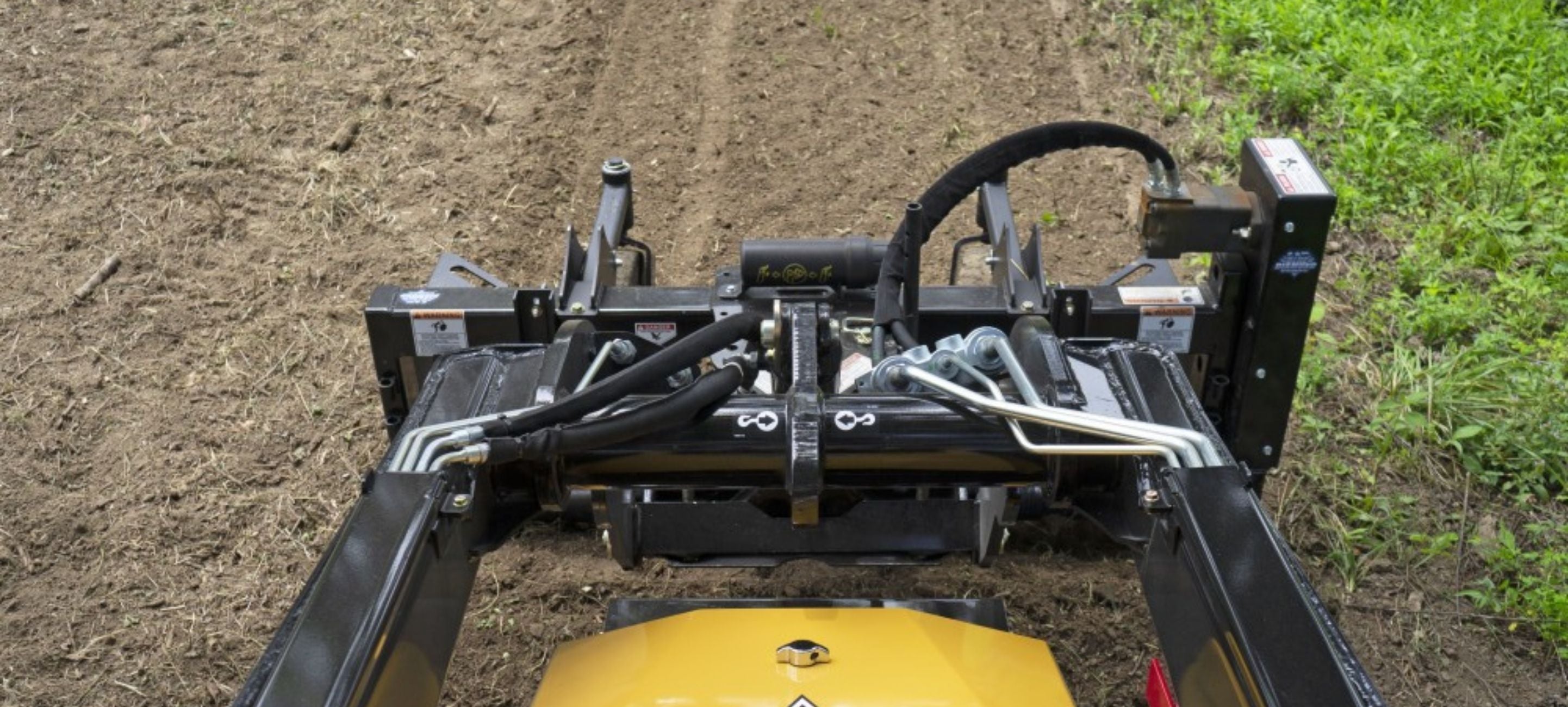 Vermeer conditioning the soil with the Blue Diamond power rake attachment