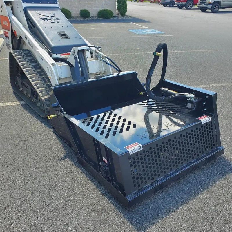 bobcat-with-the-versatile-rake-attachment