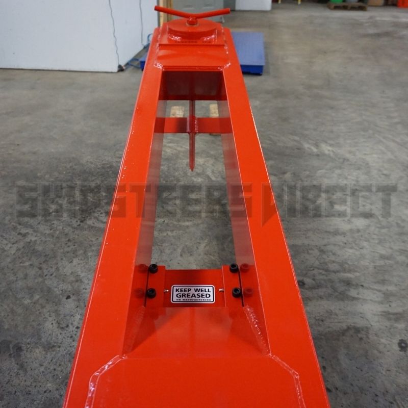 top-view-of-the-TM-Pro-2-Skid-Steer-Log-Splitter-Attachment-from-TM-Manufacturing-on-the-ground