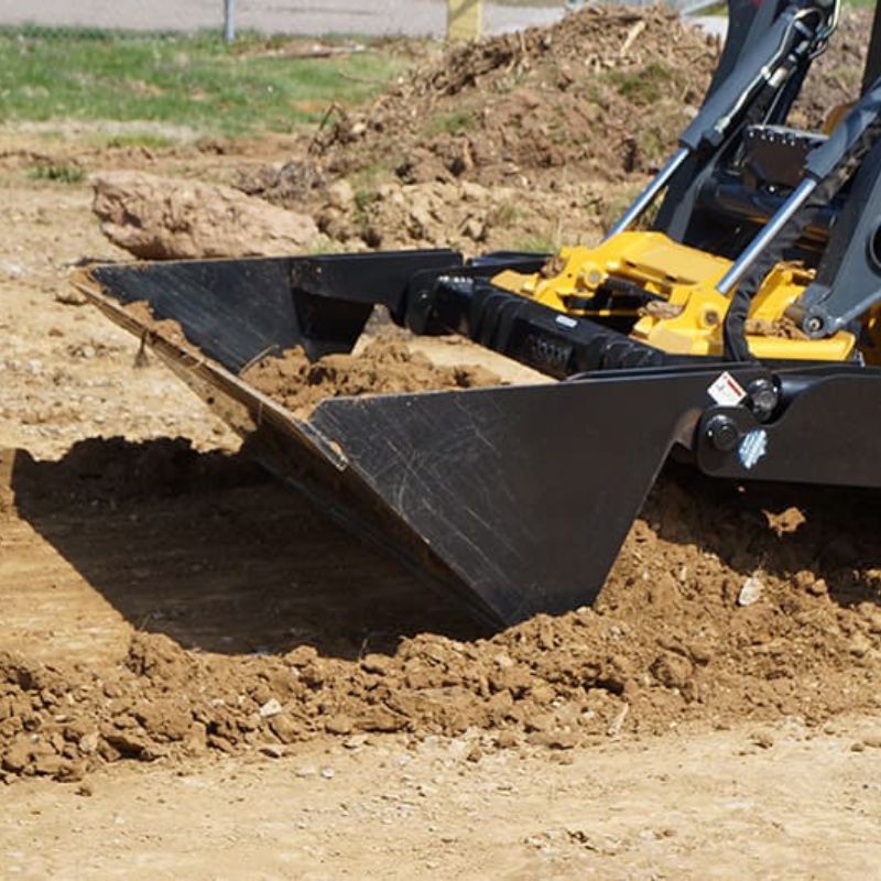 moving dirt with the 4-n-1 blue diamond bucket