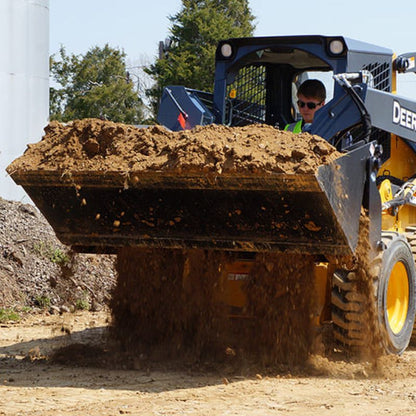 4 in 1 bucket dropping dirt from the bucket  Edit alt text