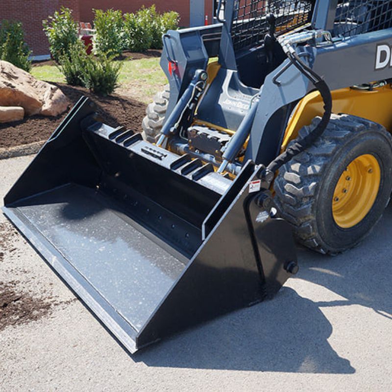 closed 4 in 1 bucket on a John Deere skid steer