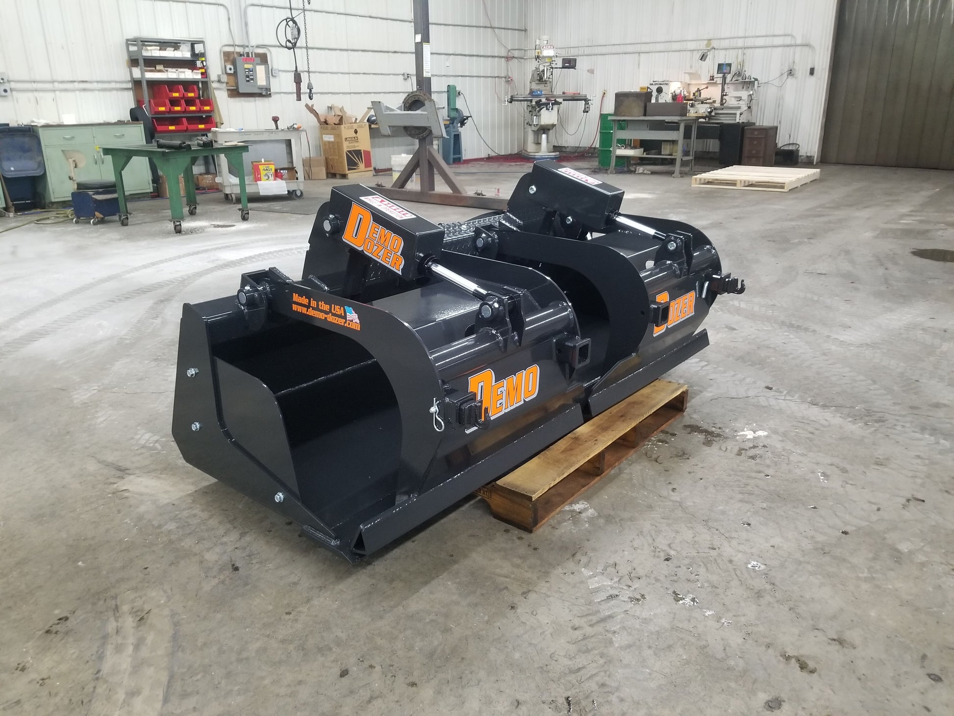 grapple bucket for skid steers from demo dozer on the ground